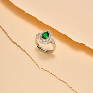 Arc And Bold Pear Cut With 2 Lines of Halo Emerald Adjustable Ring