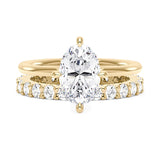 Elongated Oval Cut Moissanite Engagement Ring and Pavé Wedding Band Set