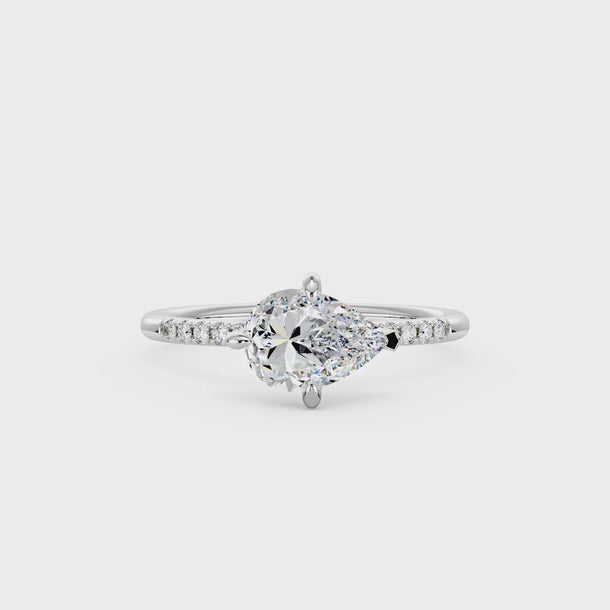 2 Carat Pear Moissanite East West Ring with Pave Band